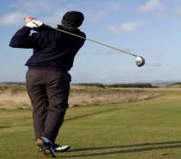 Golfer hitting his drive